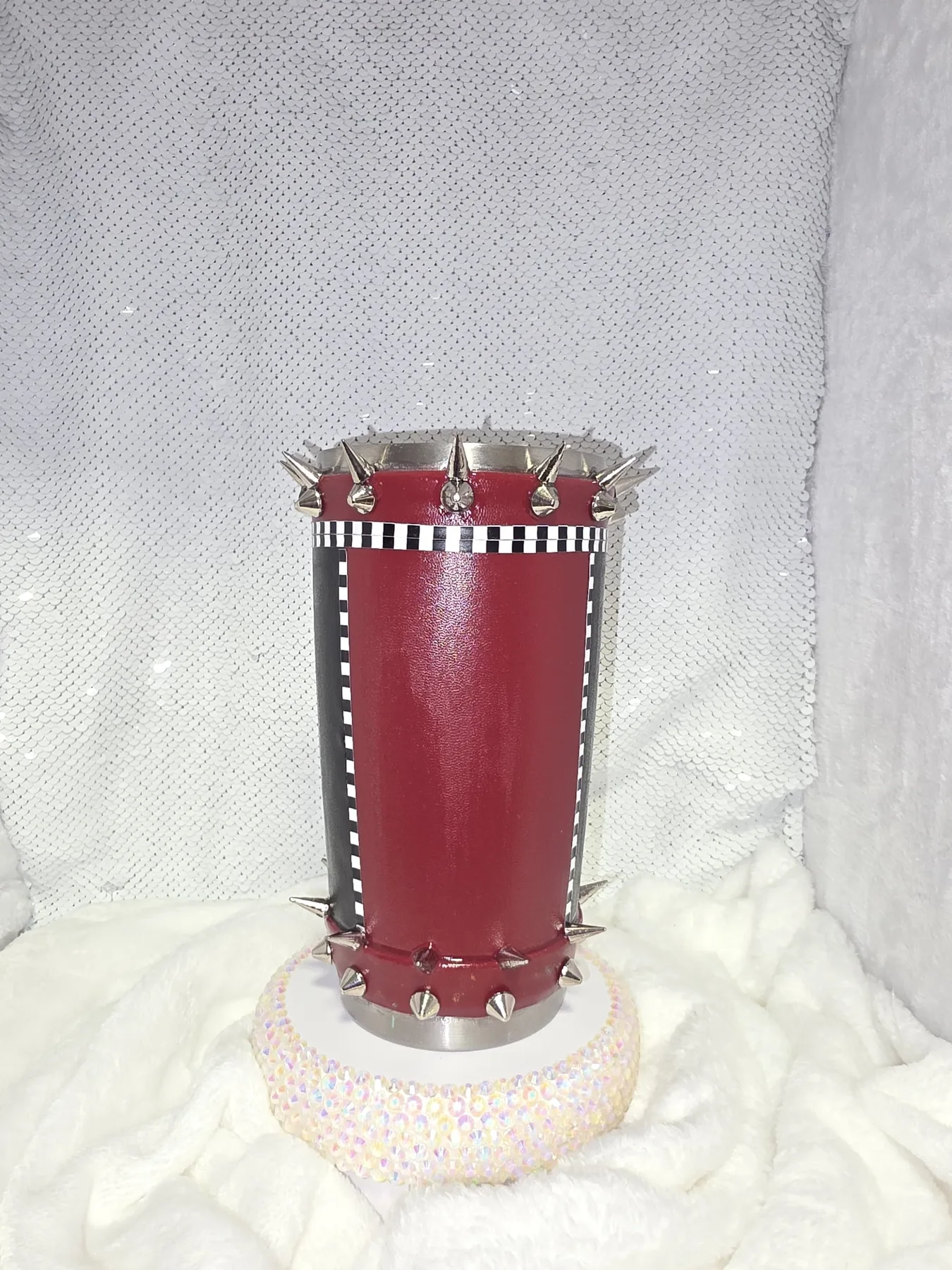 Alternate view of burgundy spiked tumbler in process before epoxy
