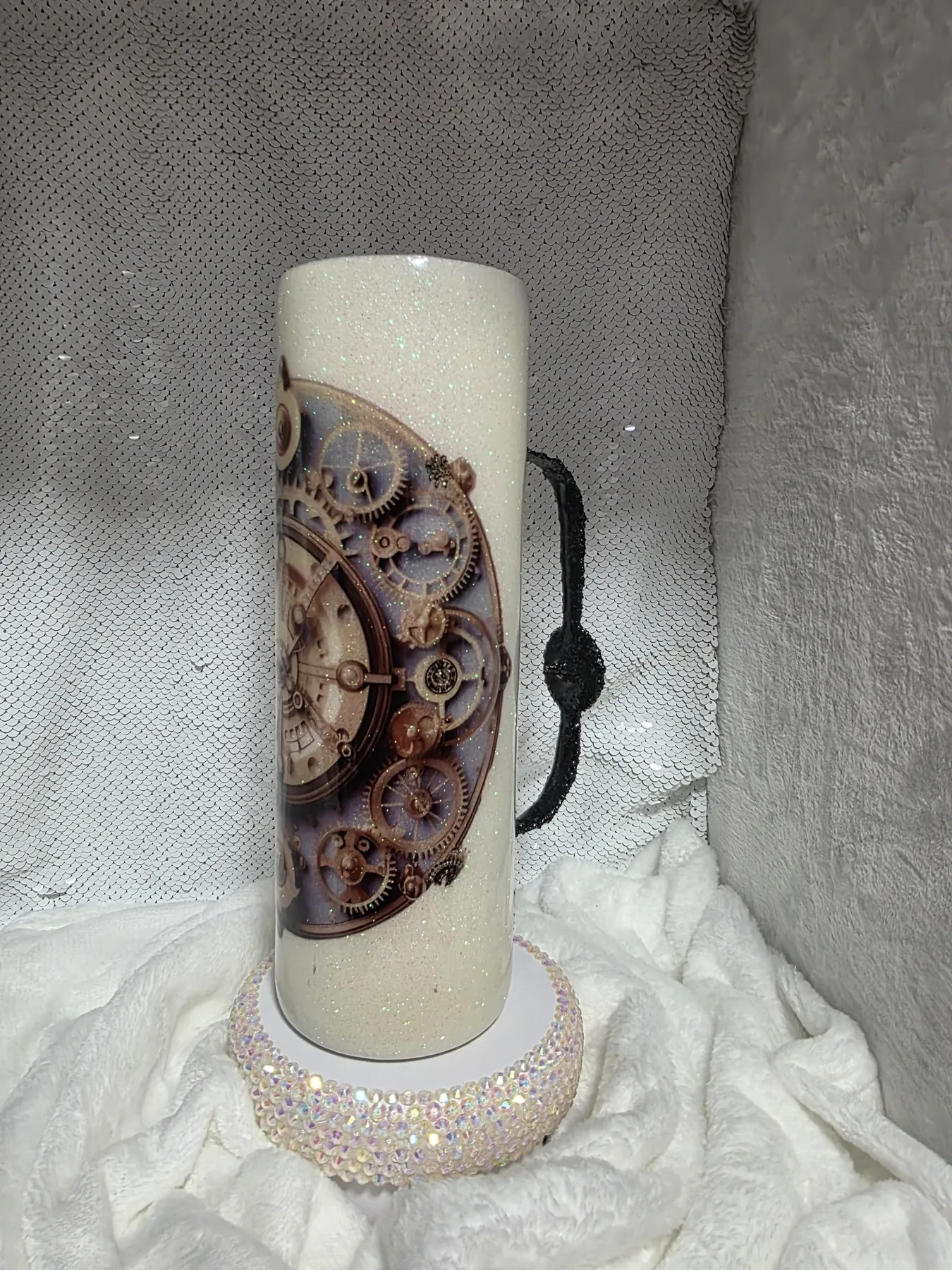 Angled detail of steampunk clock tumbler